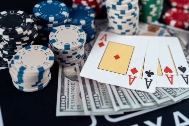 Close-up view of domino hand combinations showing different pip totals